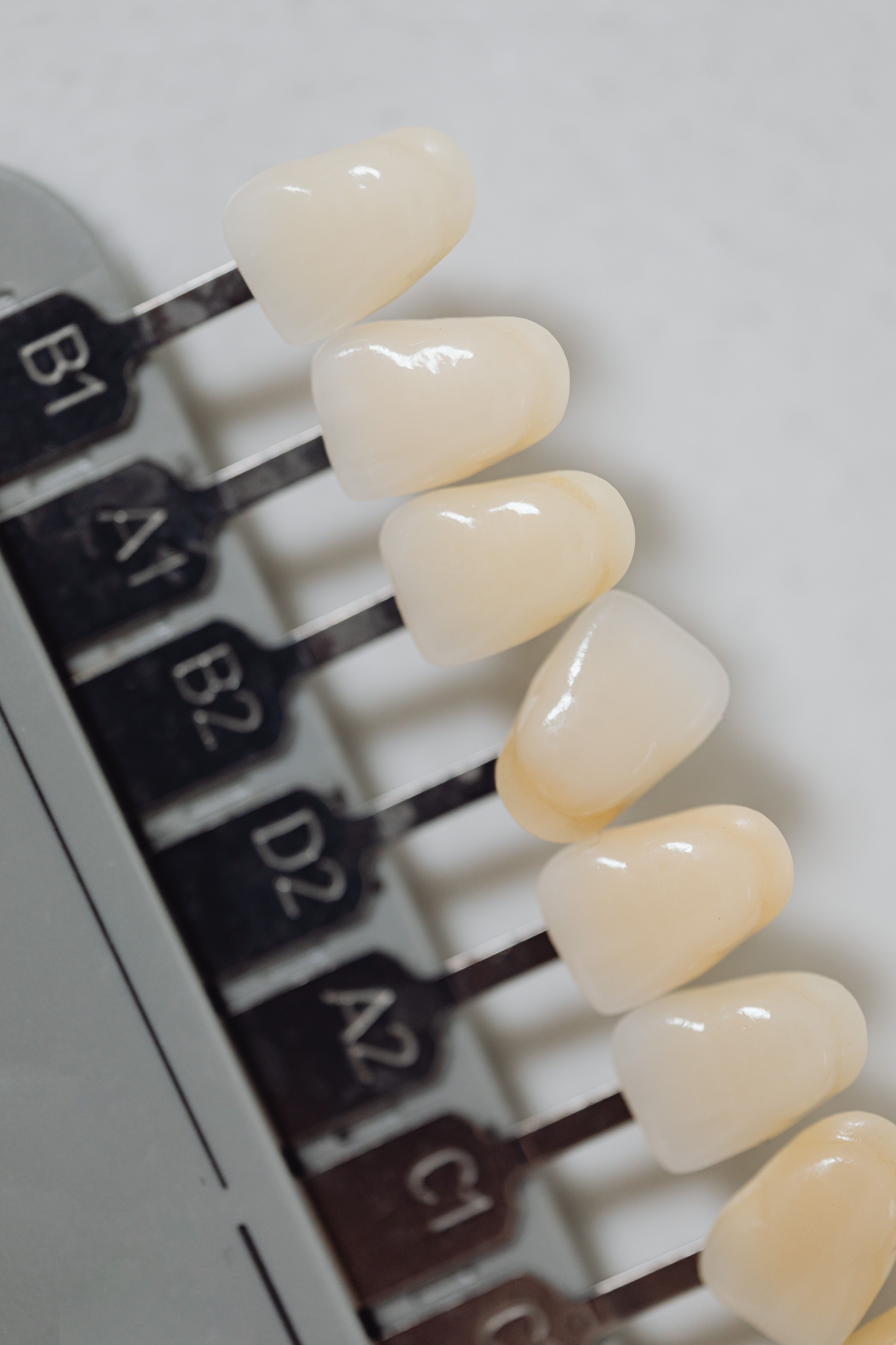 Dental hygienist cleaning patient's teeth